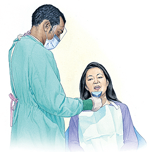 Dentist discussing orthognathic surgery treatment plan with female patient in clinical setting.