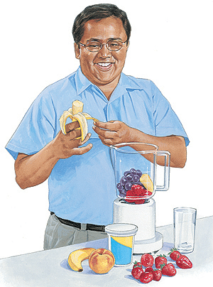Man demonstrating healthy nutrition with fresh fruits and blender for TMJ jaw health.
